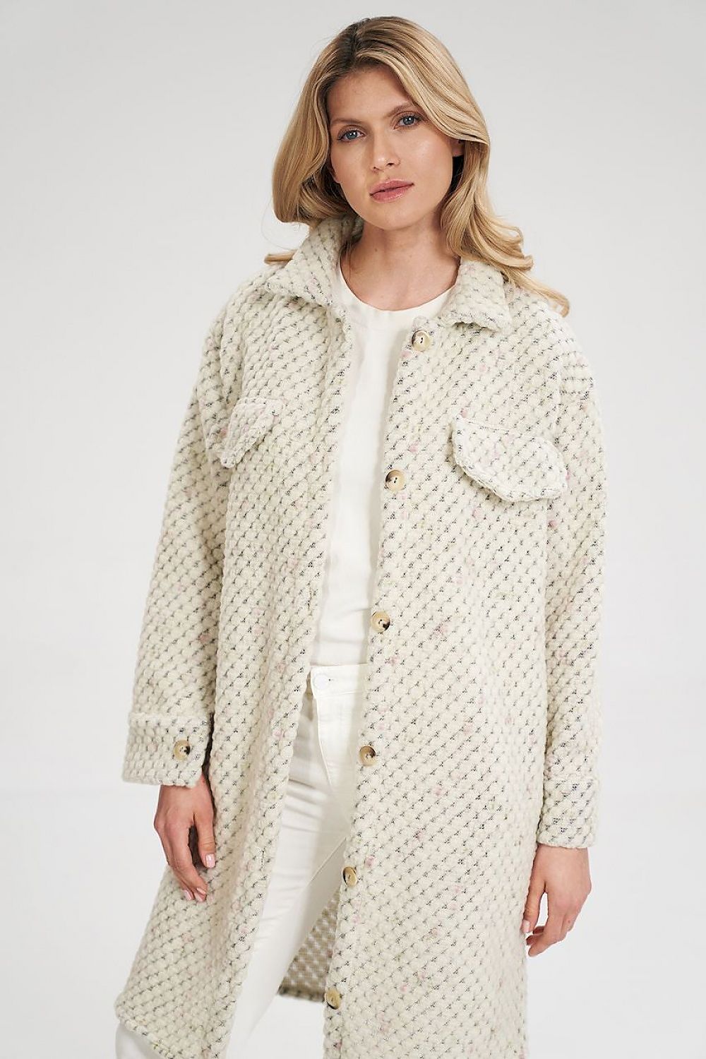 Woman wearing Vallerine Wool-Blend Midi Coat with buttoned front and decorative bust patches, showcasing light unlined design.