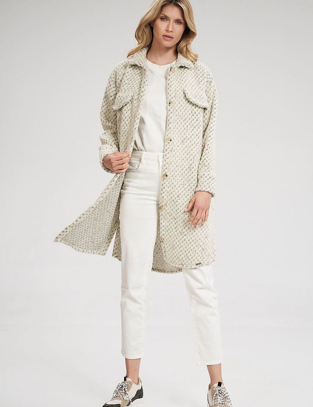 Woman wearing Vallerine Wool-Blend Midi Coat with side seam pockets and button cuffs, styled for a transitional season look.