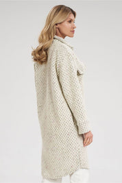 Alt Tag: Side view of Vallerine Wool-Blend Midi Coat, featuring decorative patches and button cuffs, styled for a transitional look.