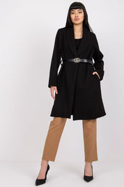 Woman wearing Corvianne Belted Buttoned Coat with side slip pockets and a black belt, showcasing a chic and versatile style.