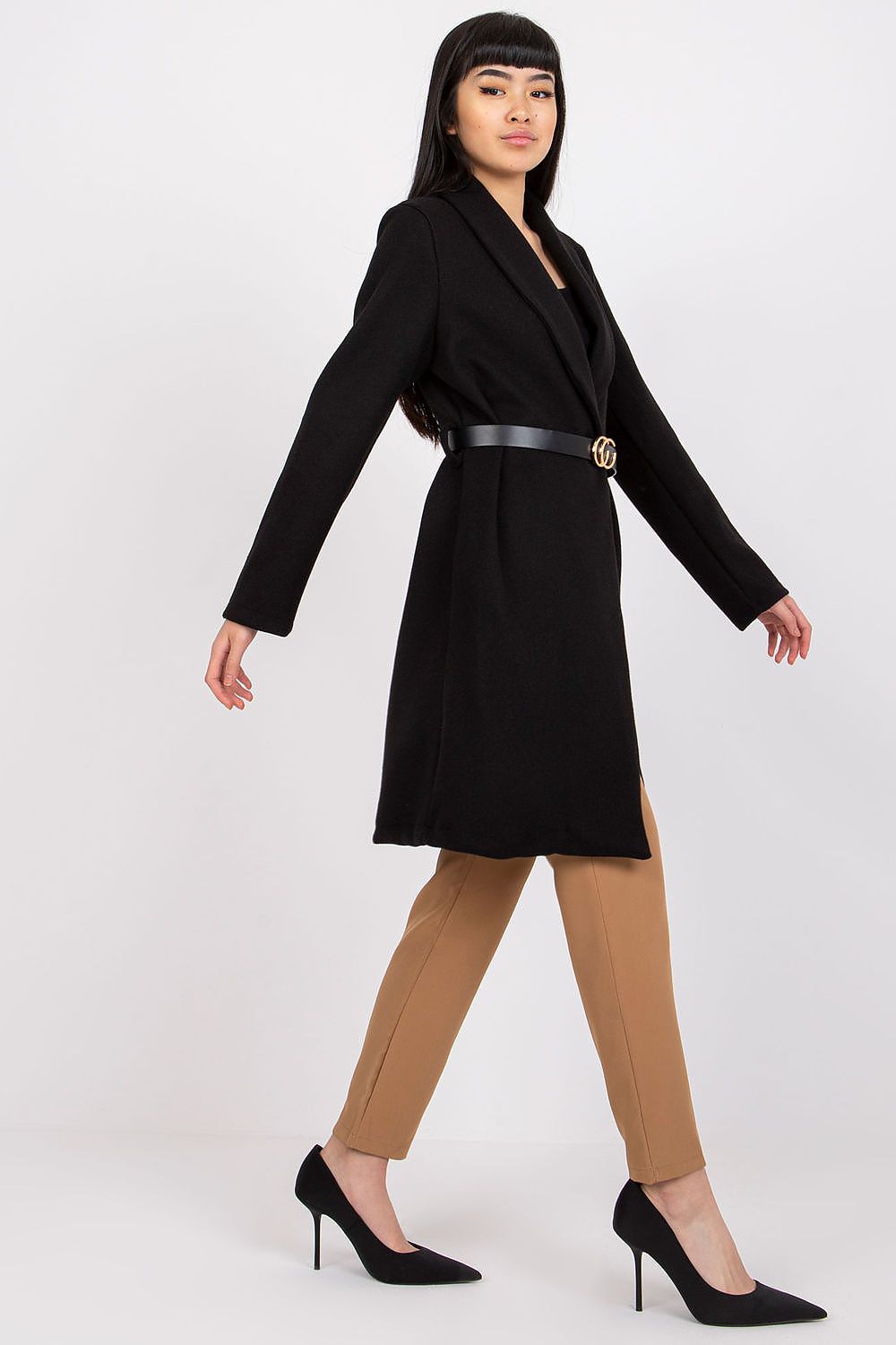 Woman wearing Corvianne Belted Buttoned Coat in black with coordinating belt, showcasing timeless elegance and versatile style.