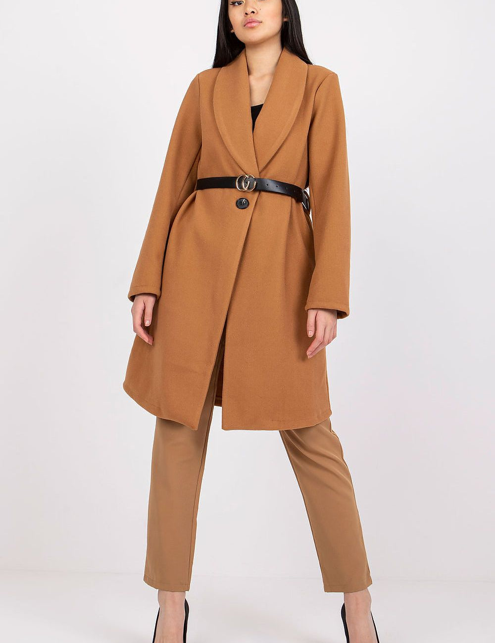 Woman wearing Corvianne Belted Buttoned Coat in brown, featuring a streamlined silhouette, long sleeves, and side slip pockets.