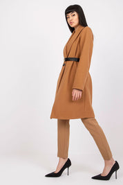 Woman wearing Corvianne Belted Buttoned Coat with sleek silhouette, long sleeves, and side slip pockets; perfect for versatile styling.
