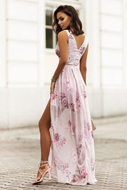 Plus Size Lorentia Chiffon Maxi Dress with V-neck, floral pattern, featuring side slit and adjustable waistband.
