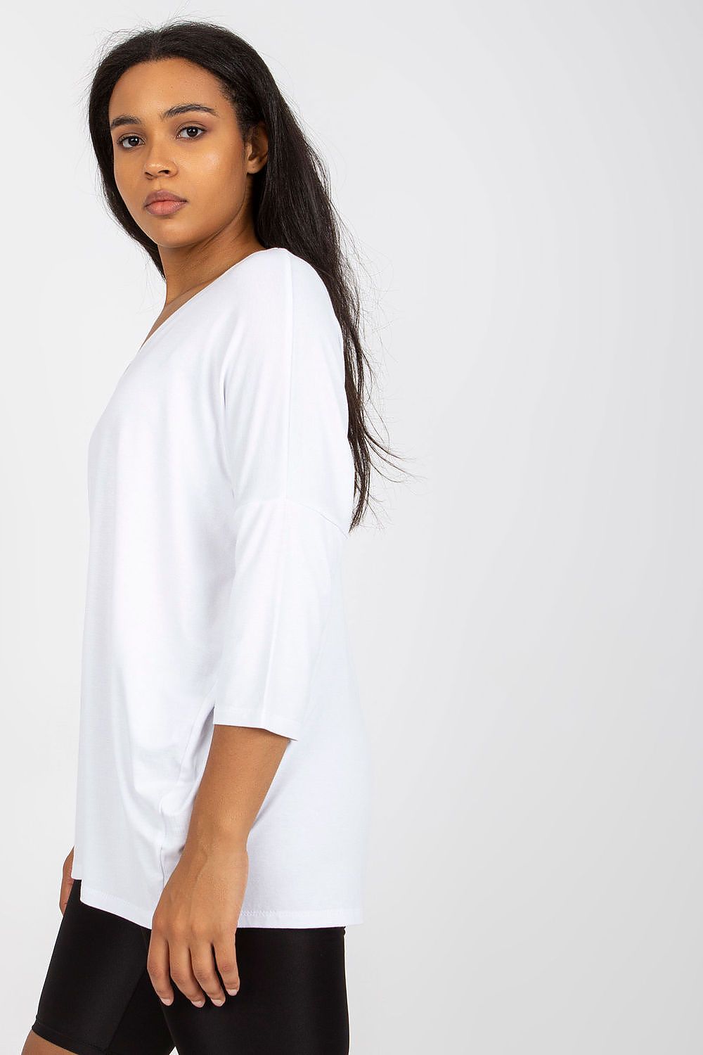Woman wearing Plus Size Melivora Sweetheart Blouse with 3/4 sleeves, showcasing elegant style and relaxed comfort