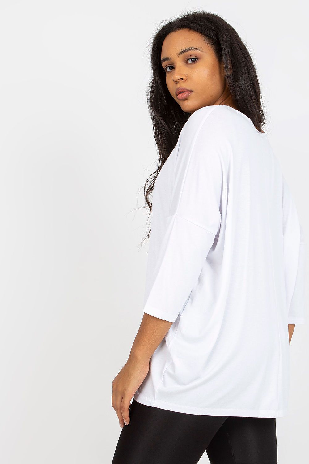 Model wearing a Plus Size Melivora Sweetheart Blouse with 3/4 sleeves, showcasing a romantic neckline and soft silhouette.