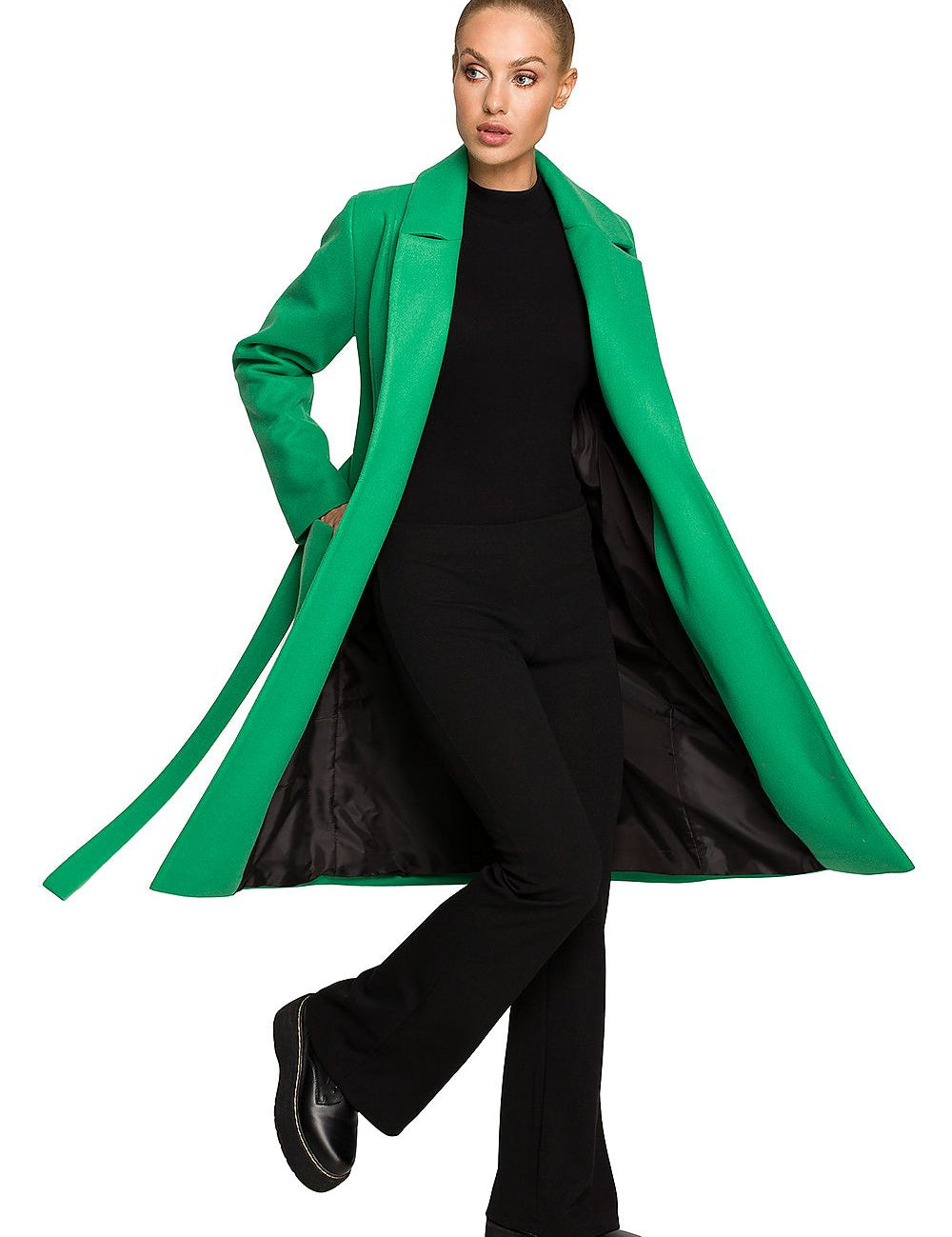 Model wearing Alvenora Belted Fleece Long Coat in green with classic collar, large pockets, and belt, showcasing its stylish design.