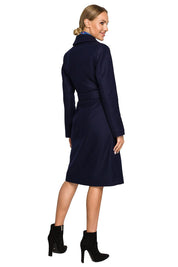 Woman wearing Alvenora Belted Fleece Long Coat in navy, showing back view. Coat features classic collar, matching belt, and patch pockets.