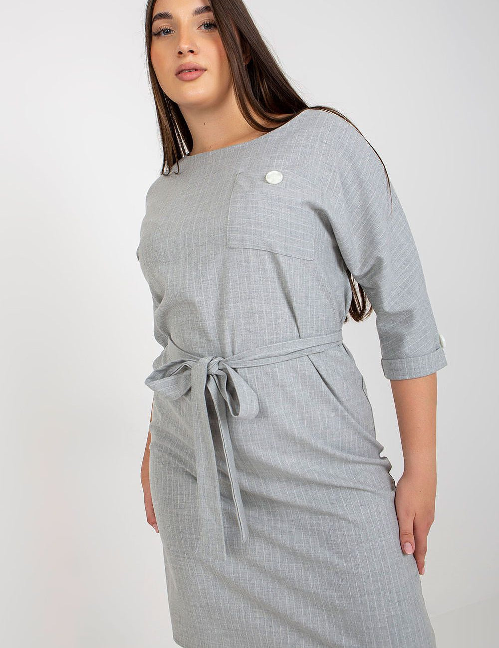 4 sleeves, round neckline, and tie belt accentuating the waist, offering a flattering fit.