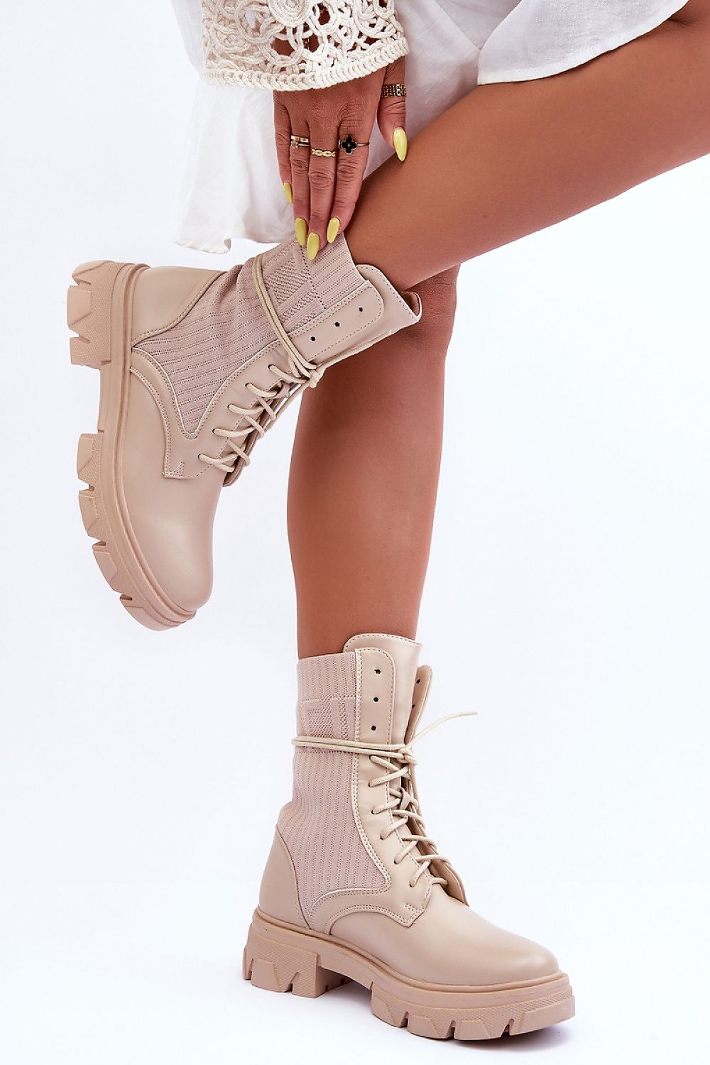 High platform boots in eco leather and stretch fabric with classic lacing system, high upper, and solid heel for urban edge style.