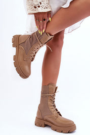 Norvessa Boundlace Sculpted Form eco leather platform boots showcasing bold design with stretch fabric and classic lacing.