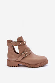 Myrrana Pearlstride Urban Motifs slip-on boots with eco leather, glinting studs, plastic pearls, and bold buckle strap on a flat heel.