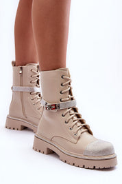 Stylish Lirvanna Ashwalk Ridge Echoes boots with rhinestone strap, grooved sole, and dual zipper-lace closure for comfort and warmth.
