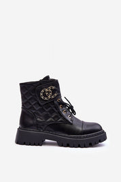 Varelline Stormrise Echo Silhouettes black ankle shoes with block heel, decorative stitching, and bold strap accent. Perfect for autumn strolls.