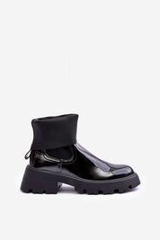 Arminne chunky ankle boots in black eco leather with side elastic inserts and flat block heel on white background