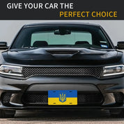 Black car with custom Ukrainian license plate displaying the Ukraine flag in durable aluminum, showcasing patriotism.