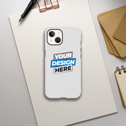 Alt Tag: Print on Demand Gloss Tough iPhone Case with dual-layer protection and customizable design on a desk with notepad and pen.
