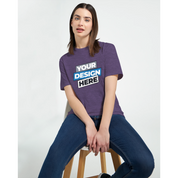 Woman wearing Zalmera women’s cotton t-shirt for print customization, showcasing comfort and style in purple, semi-fitted design.