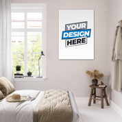 Bright bedroom with a "Your Design Here" poster, stylish decor, and ambient natural light highlighting a serene aesthetic.