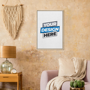 Custom framed canvas in natural wood on textured wall, modern living room decor with beige armchair and macrame art.
