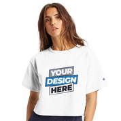 Woman wearing a Virelle cropped cotton tee with customizable print design, relaxed silhouette, and bound ribbed collar for casual style.