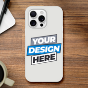 Transparent Flexi Case with customizable design, impact-resistant and wireless charging compatible, displayed on wooden desk.
