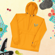 Embroidered Champion packable jacket from Ukrainian Vibe Trizub Collection in vibrant orange with hood and practical storage features.
