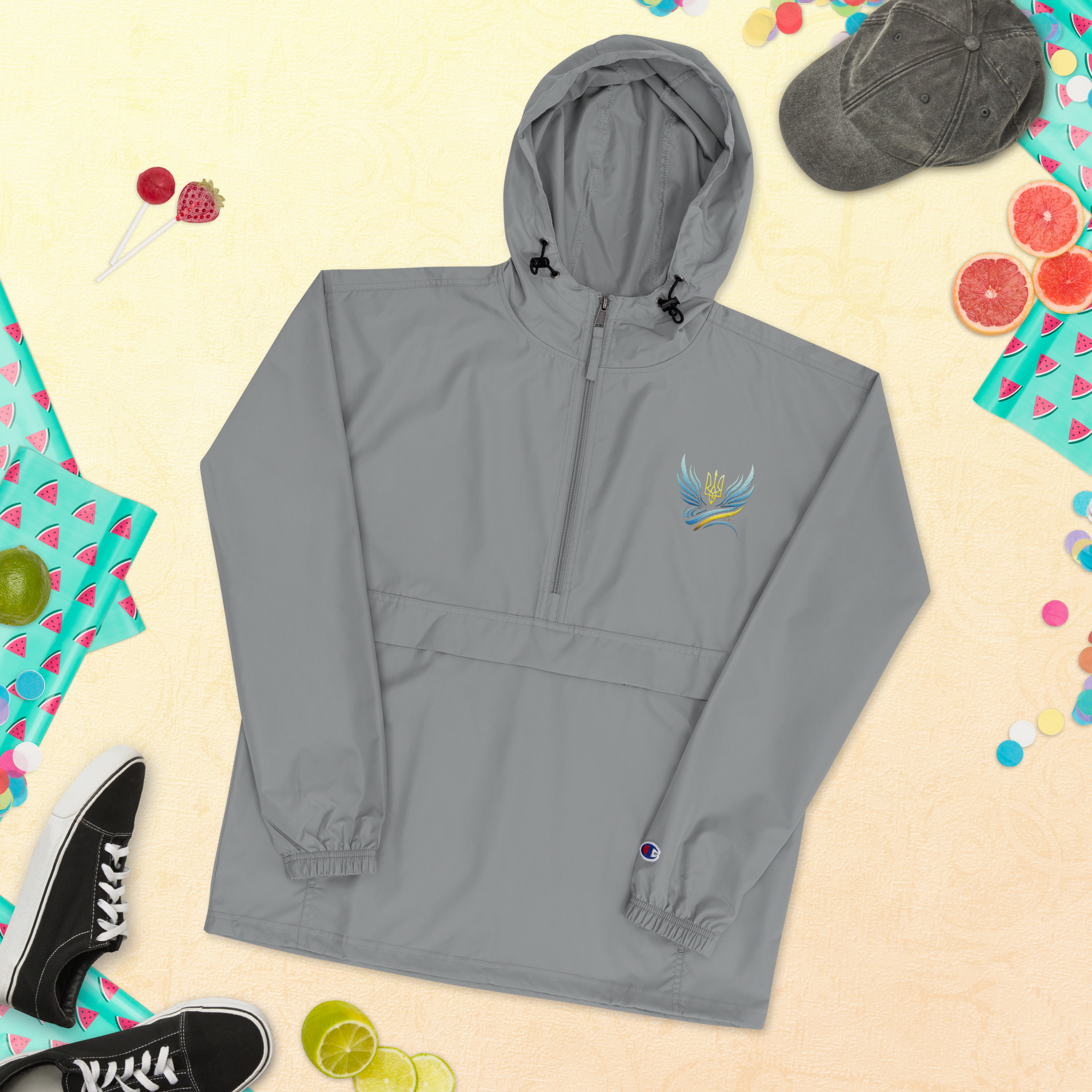 Women's Champion packable jacket from Ukrainian Vibe Trizub Collection with embroidery, gray, hooded, wind- and rain-resistant.