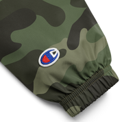 Camo sleeve of Champion packable jacket from Ukrainian Vibe Trizub Collection with embroidered logo