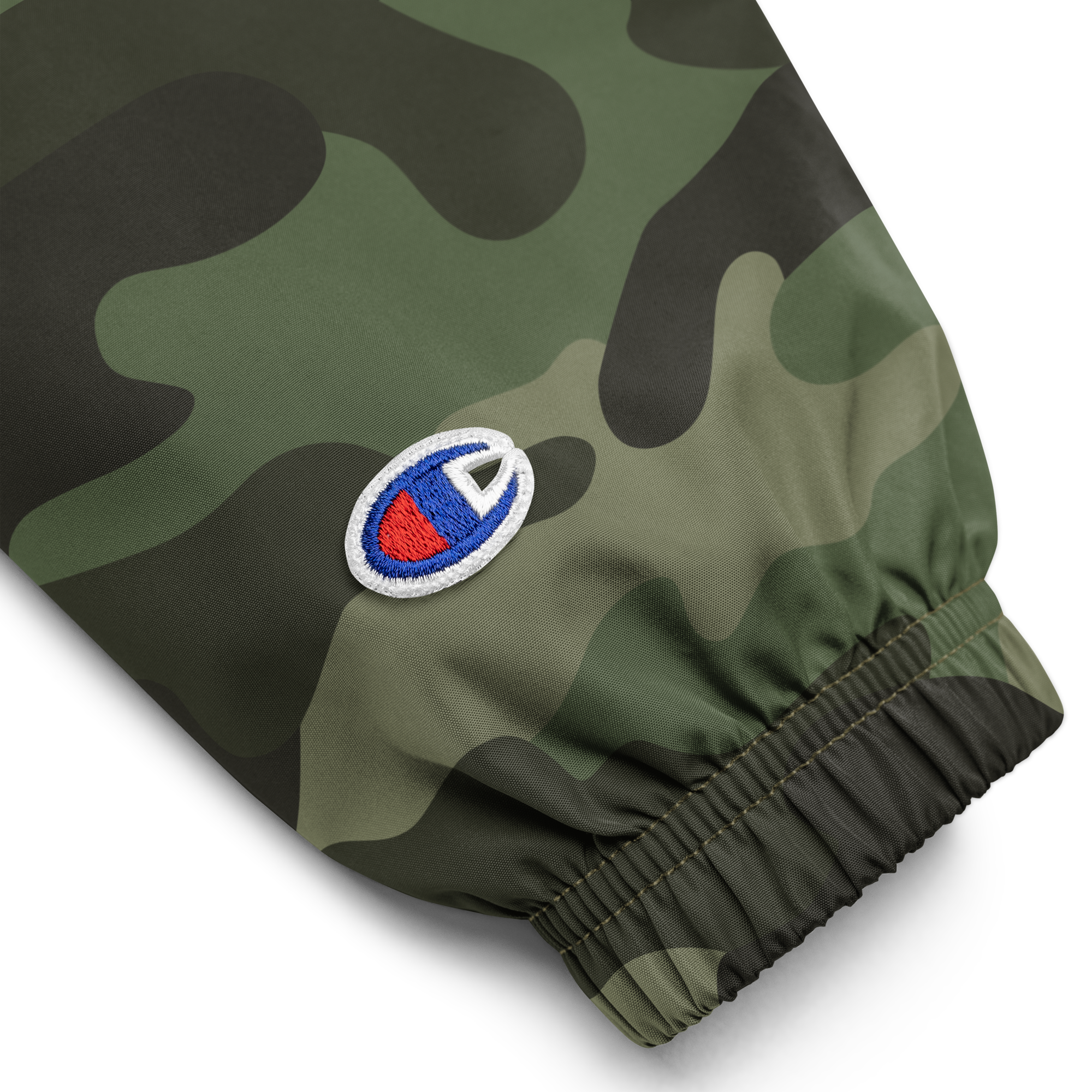 Camo sleeve of Champion packable jacket from Ukrainian Vibe Trizub Collection with embroidered logo