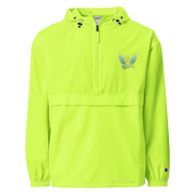 Bright green Champion packable jacket with embroidery from Ukrainian Vibe Trizub Collection, featuring hood and kangaroo pocket.