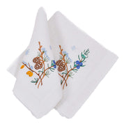 Embroidered linen napkins with floral and pinecone design, complementing the Ukrainian linen tablecloth set.