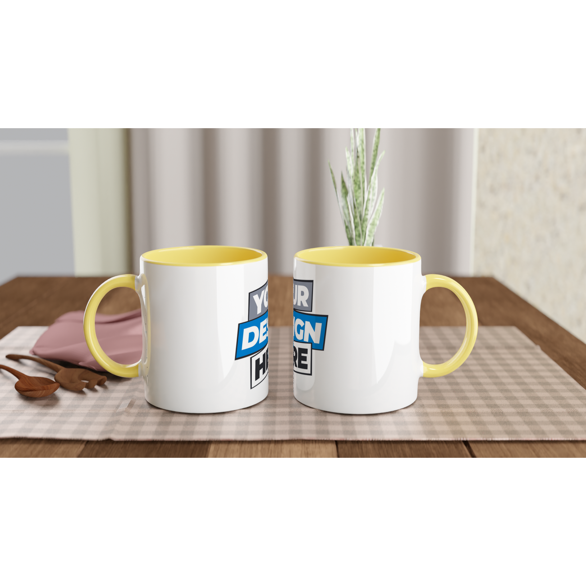 Two Irvelle ceramic mugs with color accents on a plaid tablecloth.