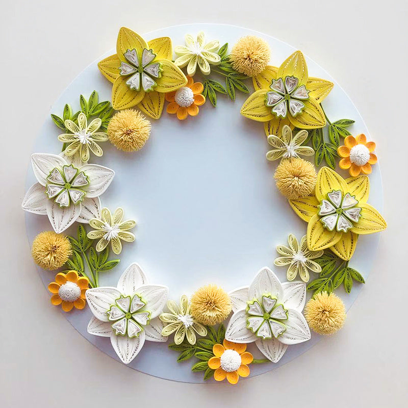 Handmade quilted paper garland with yellow and white flower design, crafted from high-quality craft paper.