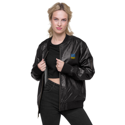 Woman wearing Ukrainian Vibe Tryzub Edition leather bomber jacket, showcasing a chic and versatile fashion style.