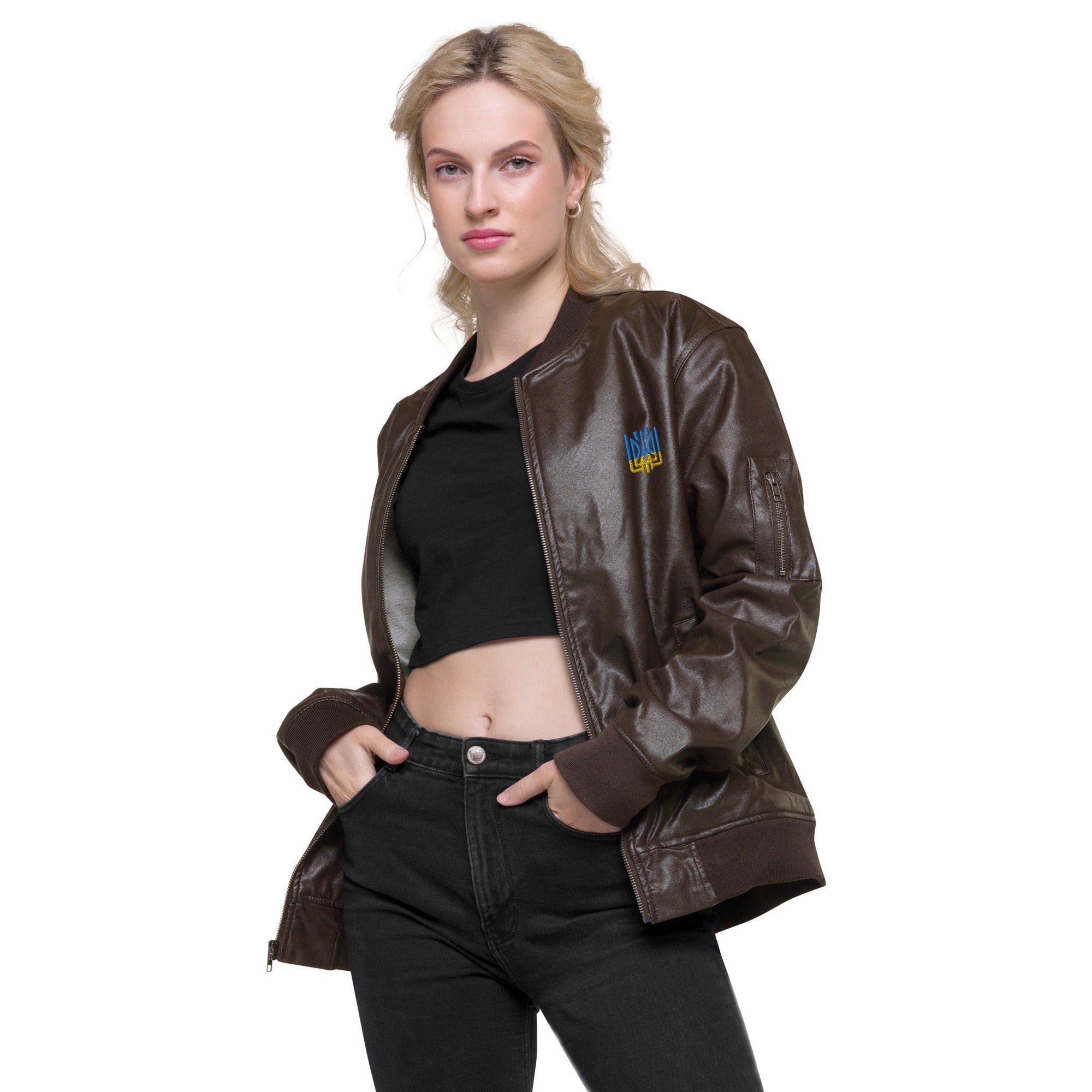 Woman wearing Ukrainian Vibe Tryzub Edition leather bomber jacket, showcasing chic and sporty style in high-quality PU leather.