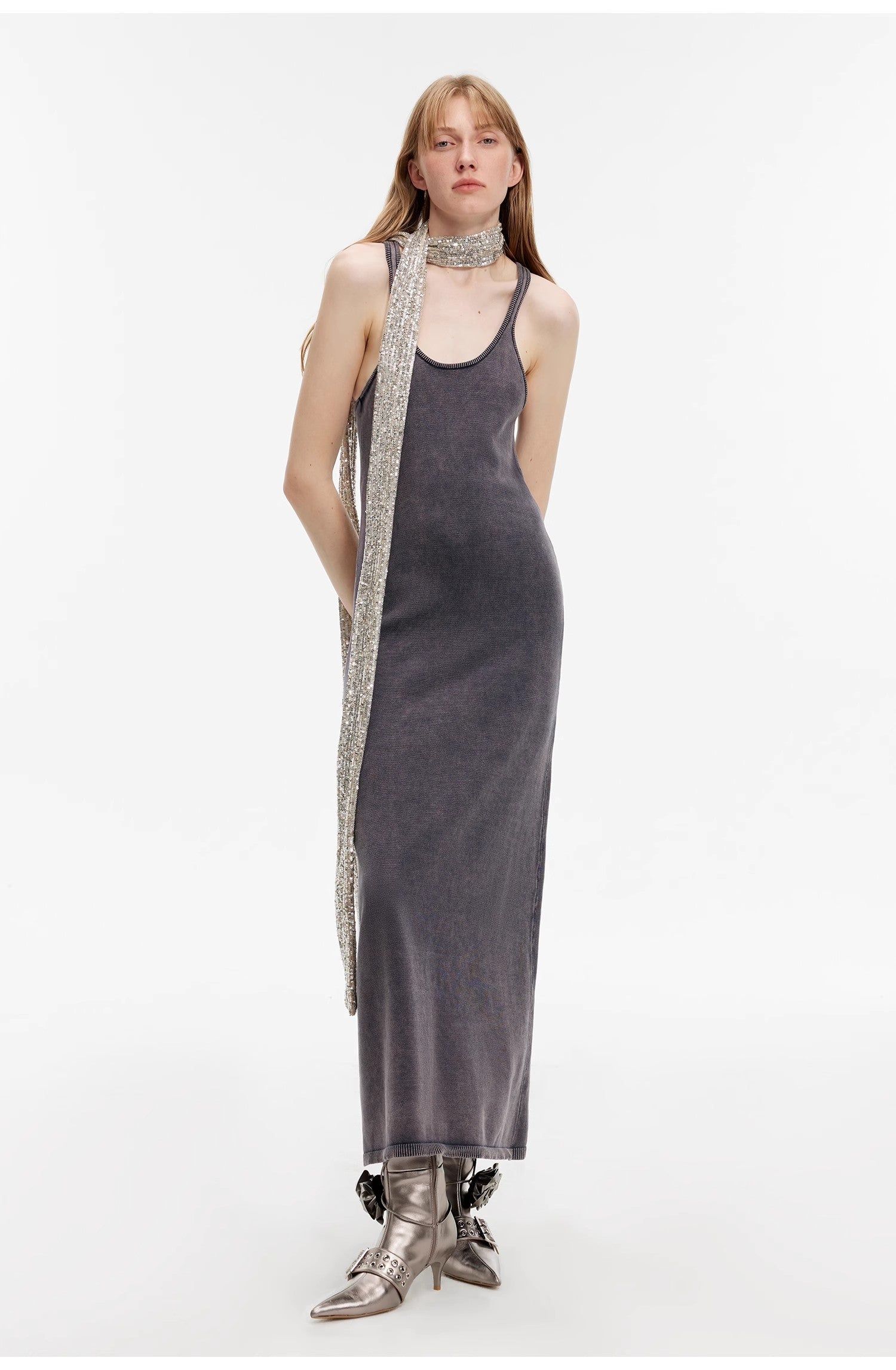 Feryn enzyme-washed cotton vest dress with U-neck, featuring a subtly distressed texture, worn by a model with a silver scarf.