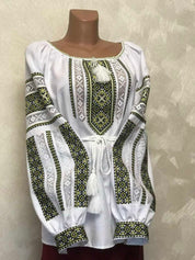 Galician Folk Vyshyvanka women's embroidered blouse with green cross-stitch patterns, traditional Ukrainian style.