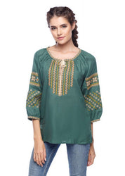 Green linen boho blouse with Alatyr star embroidery, Ukrainian ethnic peasant chic top, featuring ¾ raglan sleeves and tassel neckline.