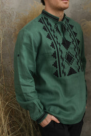 Green linen men's embroidered Ukrainian shirt with traditional vyshyvanka design, perfect gift for festive occasions.