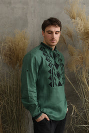 Green linen embroidered men's shirt, traditional Ukrainian vyshyvanka with intricate patterns, perfect cultural gift for him.