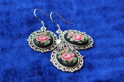 Hand-embroidered jewelry set with Petit Point silk floral pendant and earrings showcasing vibrant floral bouquet embroidery.