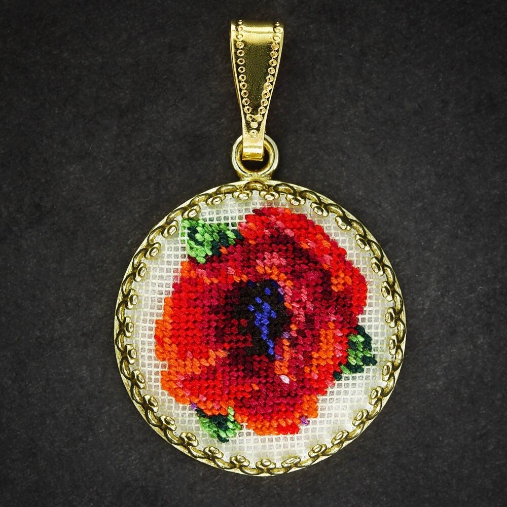 Hand-embroidered pendant necklace with floral Petit Point silk art, showcasing a refined Ukrainian micro-embroidery technique.