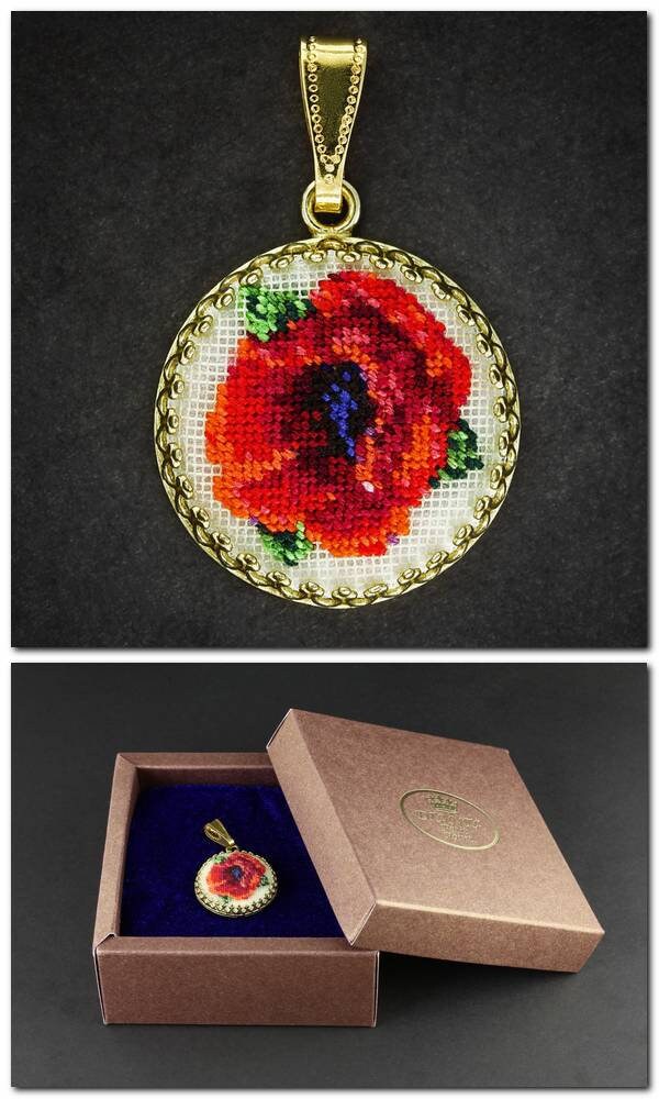 Hand-embroidered floral pendant necklace in box, featuring Petit Point silk embroidery with red and green floral design.