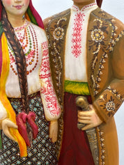 Hand-painted wooden couple figurine showcasing Ukrainian folk artistry, ideal as a wedding or 5th anniversary gift, 35 cm tall.