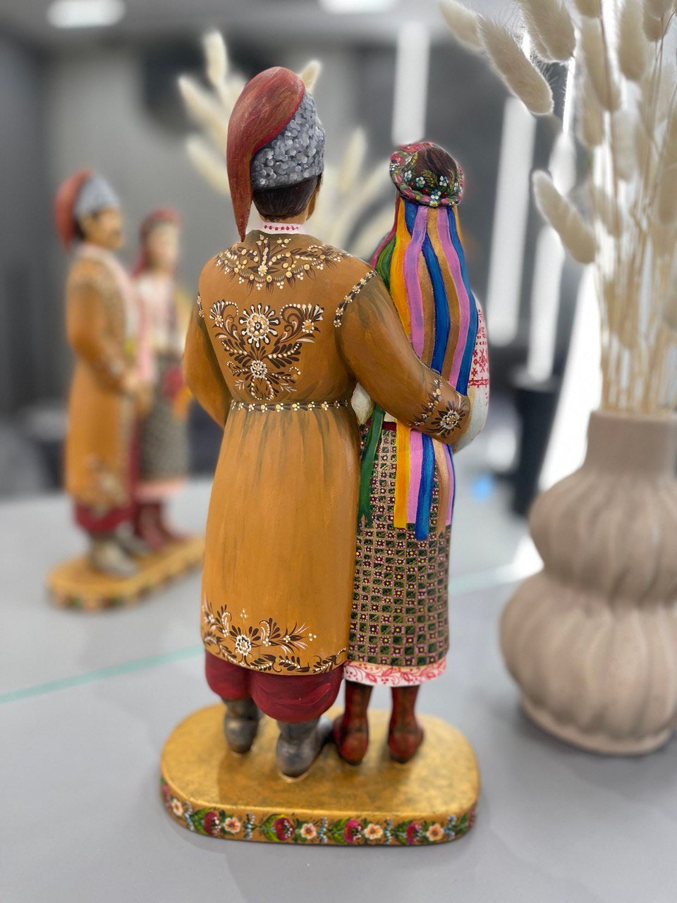 Hand-painted wooden couple figurine, Ukrainian folk art, wedding or 5th anniversary gift, 35 cm tall, natural linden wood.