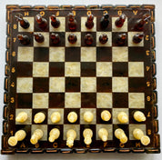 Handcrafted Baltic amber chess set with elegant amber-inlaid board, perfect for collectors and chess enthusiasts.
