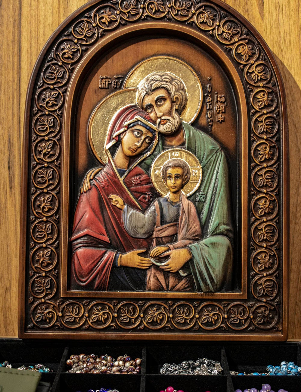 Handcrafted wooden icon of the Holy Family, Byzantine Christian art, Ukrainian religious gift, unique hand-carved design.