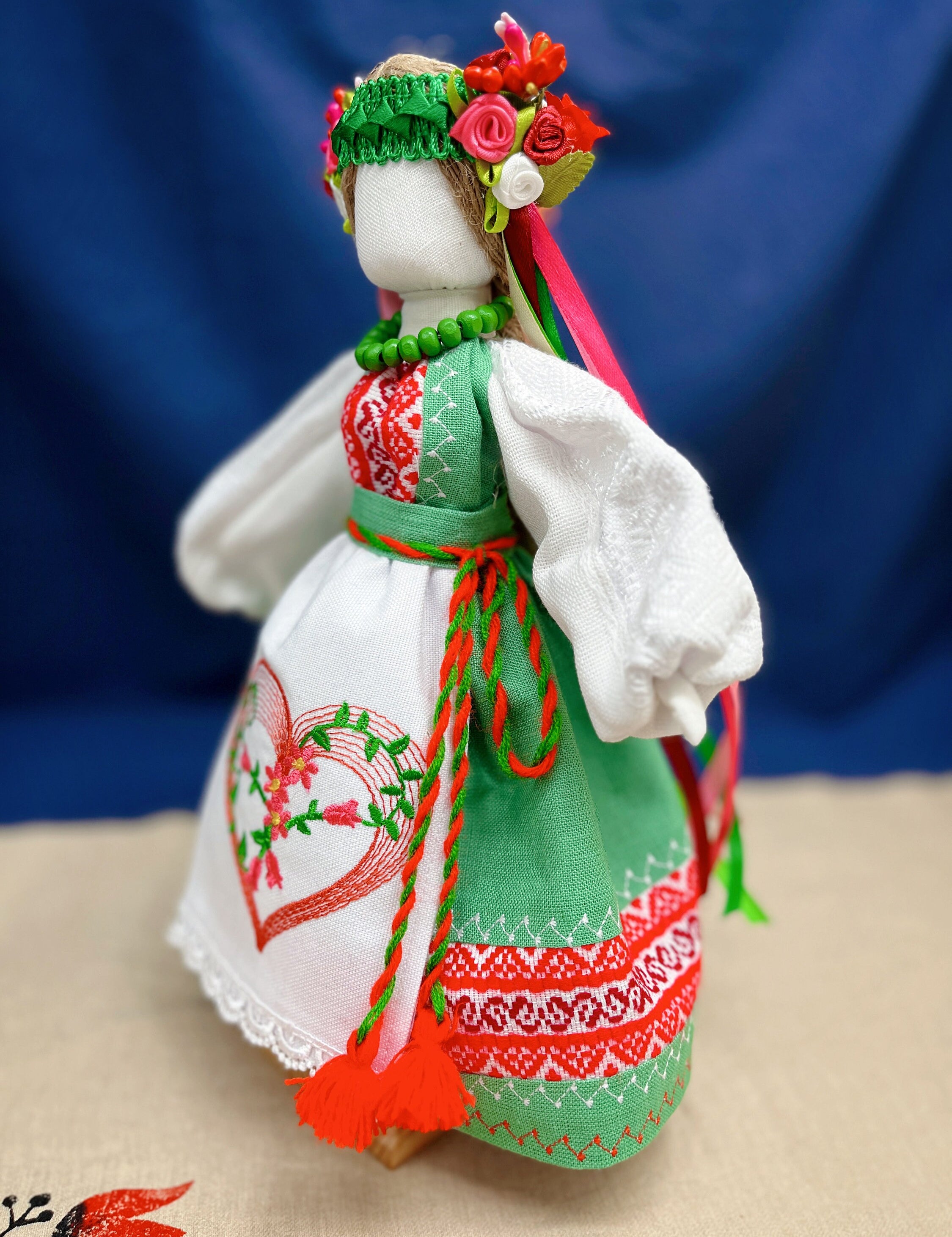 Handmade Ukrainian Motanka Doll "Spring Bride" in traditional attire with vibrant embroidery, a cultural guardian for home and prosperity.
