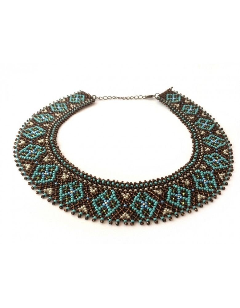 Handmade Ukrainian Sylyanka necklace with ceramic and turquoise beads, featuring ethnic geometric patterns, traditional folk jewelry.
